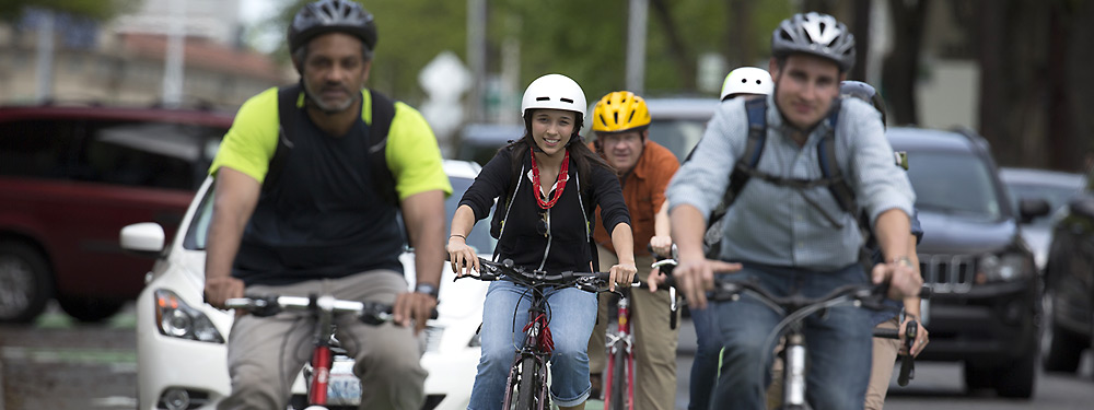 bicyclists biking with traffic